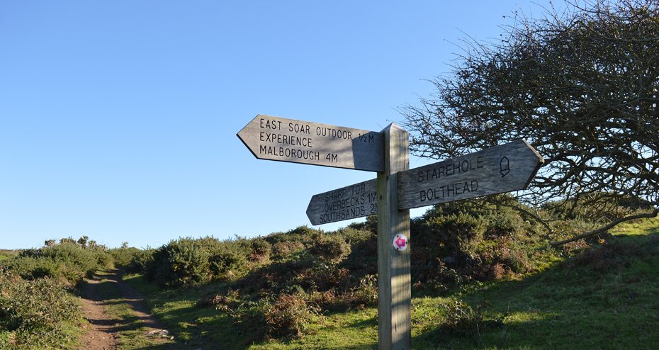 A sign towards the top of the hill by Starehole Bay