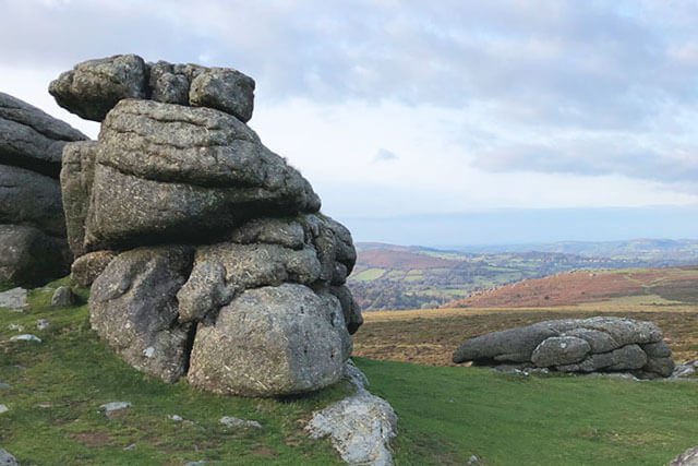 a view of haytor rocks and across dartmoor national park.