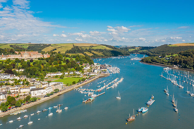 Aerial view of Dartmouth with boats in harbour.