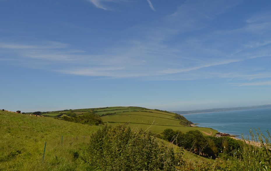 A panoramic view of Start Bay and the surrounding countryside above Hallsands